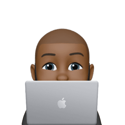 Person peeking behind laptop